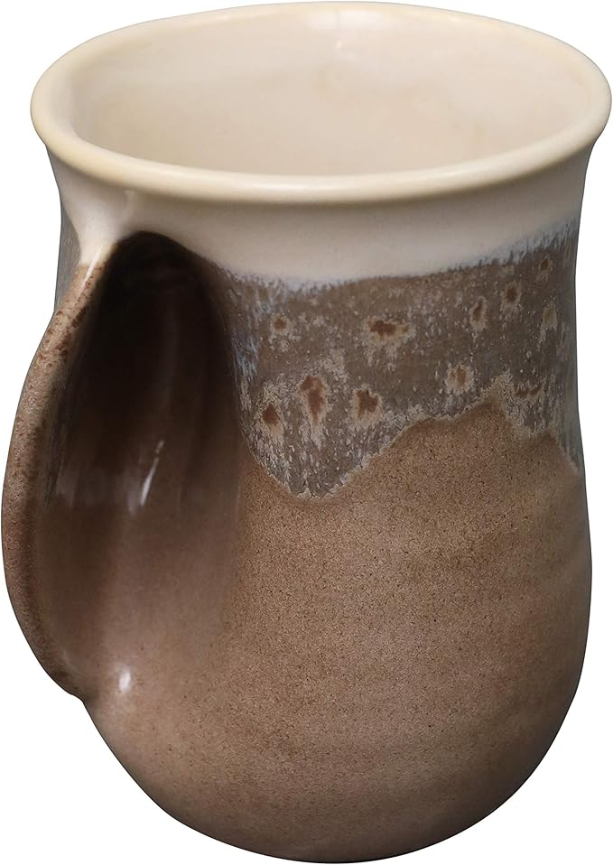 Clay in Motion Hand Warmer Coffee Mug – Handmade Coffee Mug With Comfortable Handle Contoured Pocket Hand Warming Ceramic Coffee Mug – Proudly Made in USA – Left Handed – 14 Oz - Desert Sand