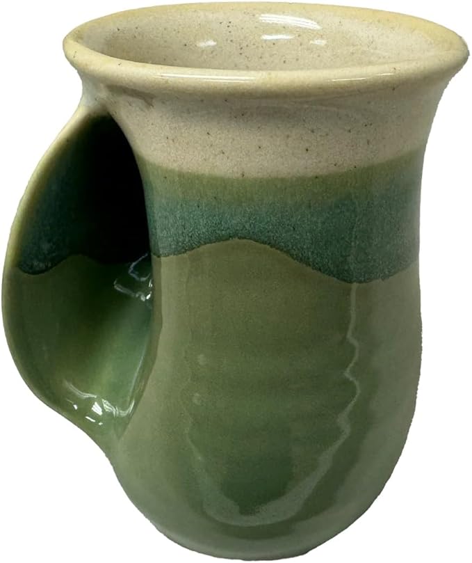 Clay in Motion Hand Warmer Coffee Mug – Handmade Coffee Mug With Comfortable Handle Contoured Pocket Hand Warming Ceramic Coffee Mug – Proudly Made in USA – Left Handed – 14 Oz - Grass Lands